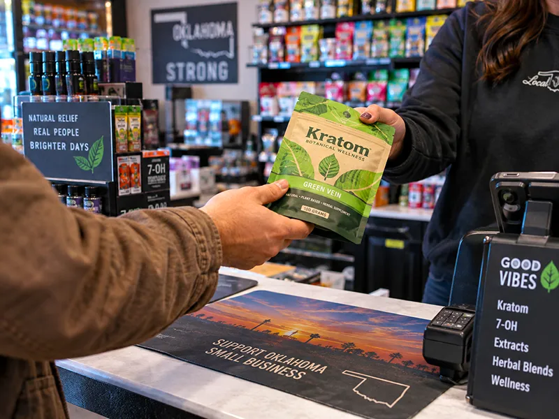 Customer purchasing a kratom package from a retail clerk in Oklahoma